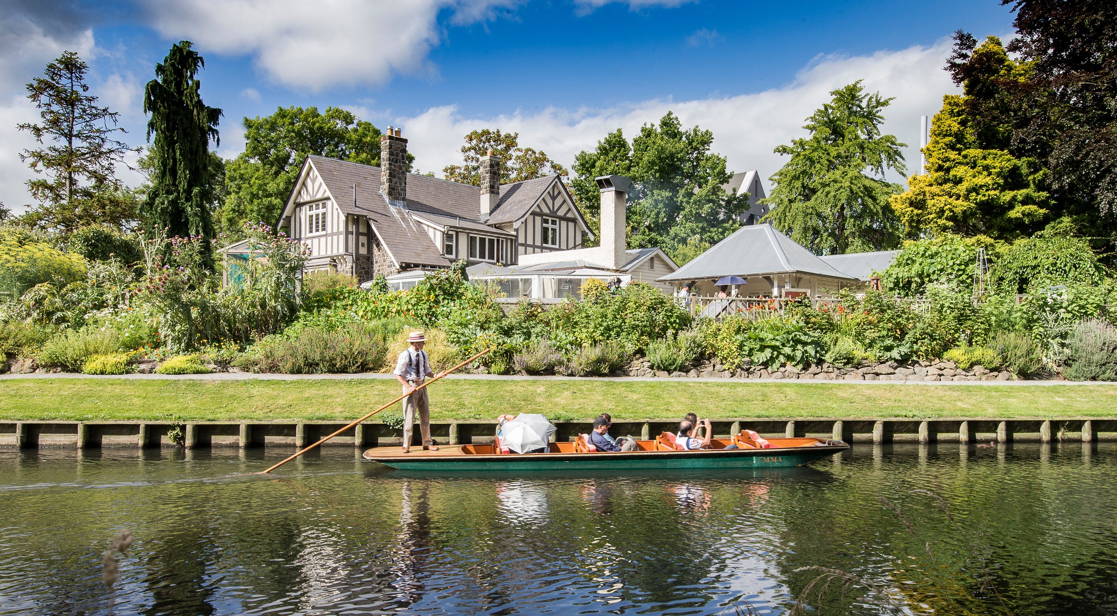 Punting on the Avon River past Curator's House in central Christchurch