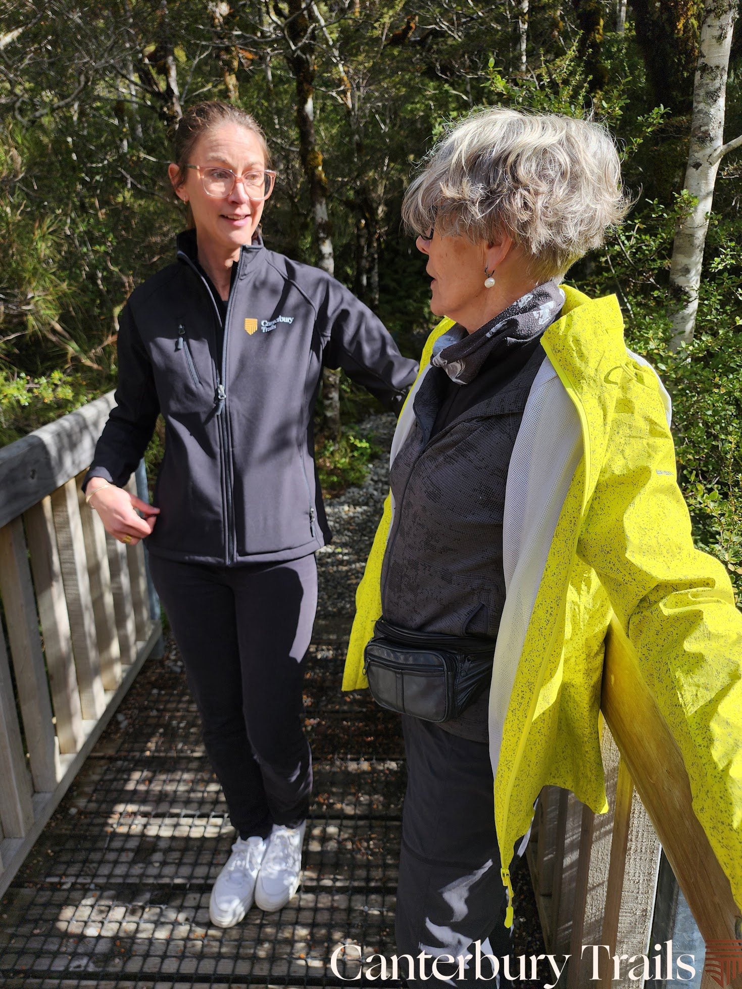 A Canterbury Trails guide talking with a guest on a gentle South Island nature walk