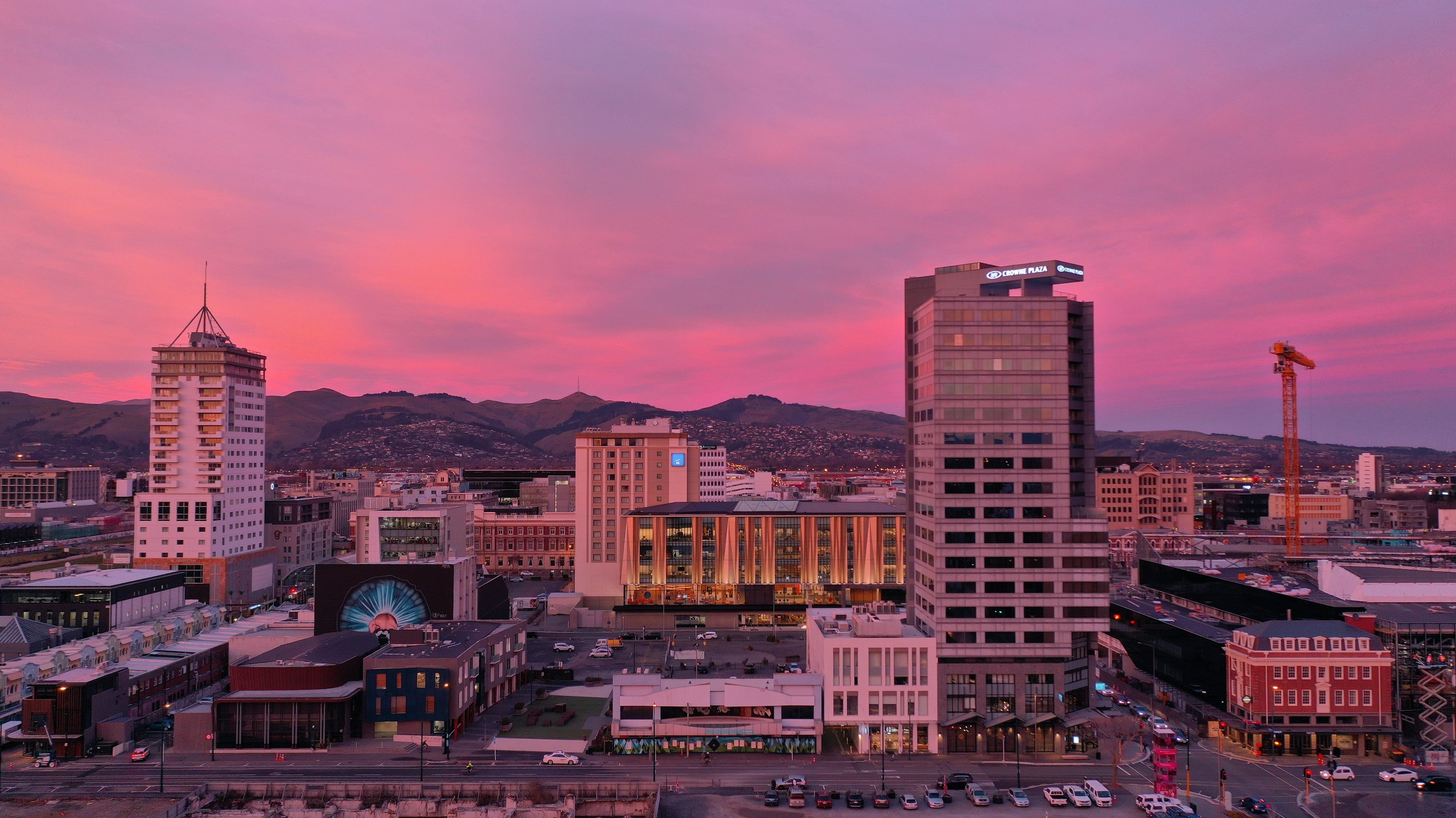 Aerial view over Christchurch at sunset with the Southern Alps beyond