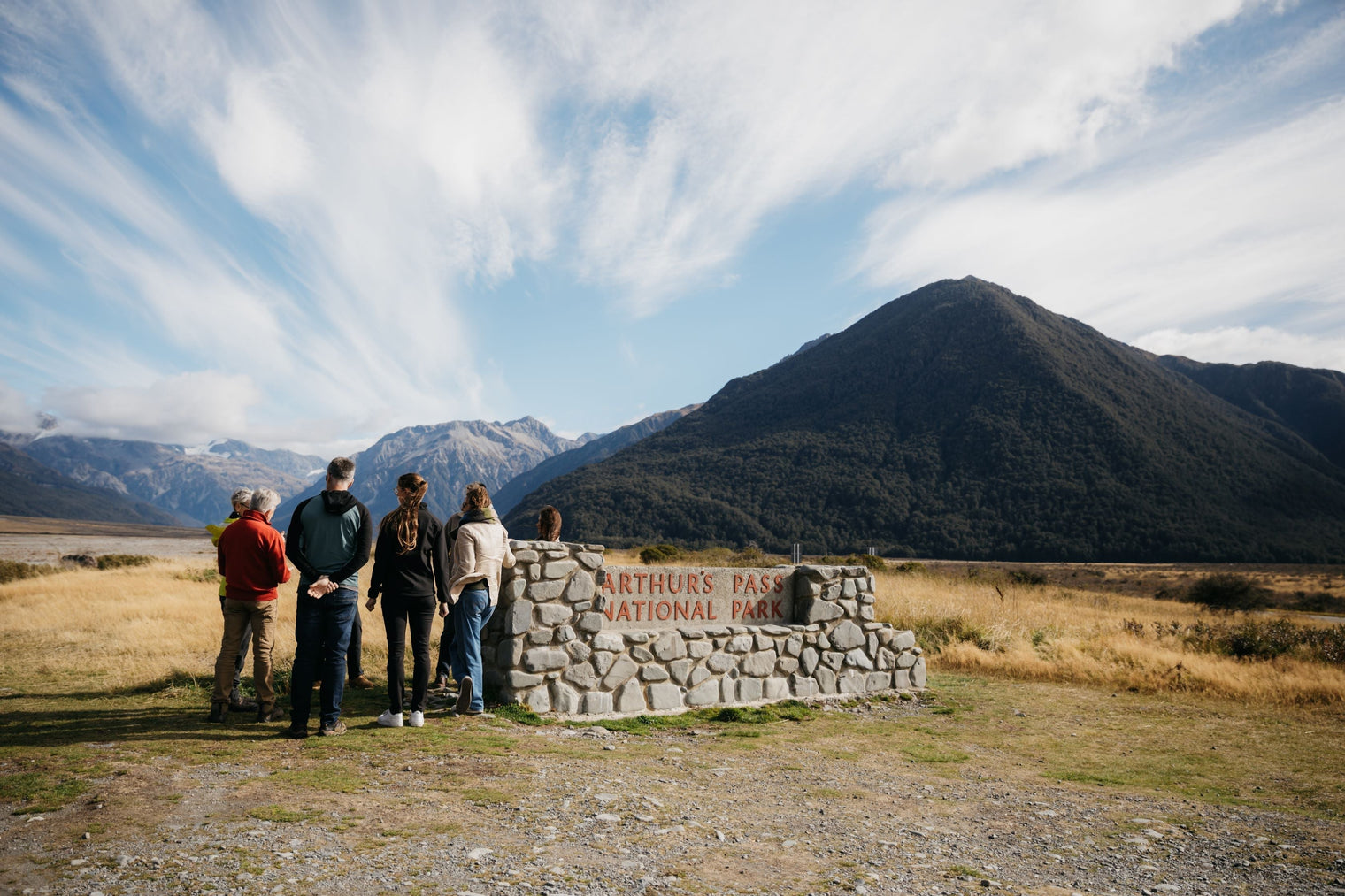 People at the entrance to Arthurs Pass Park