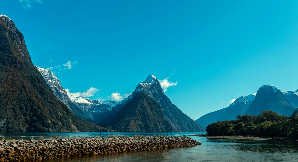 Mitre Peak rising from the still water of Milford Sound