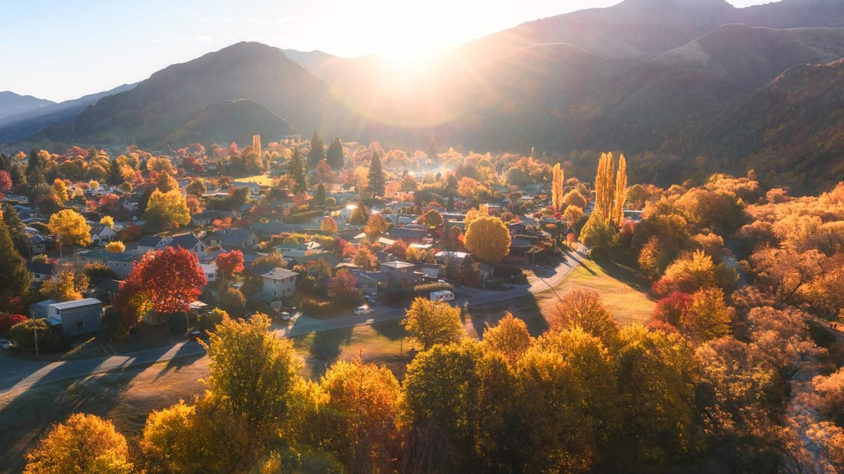 Arrowtown in autumn colour beneath the hills