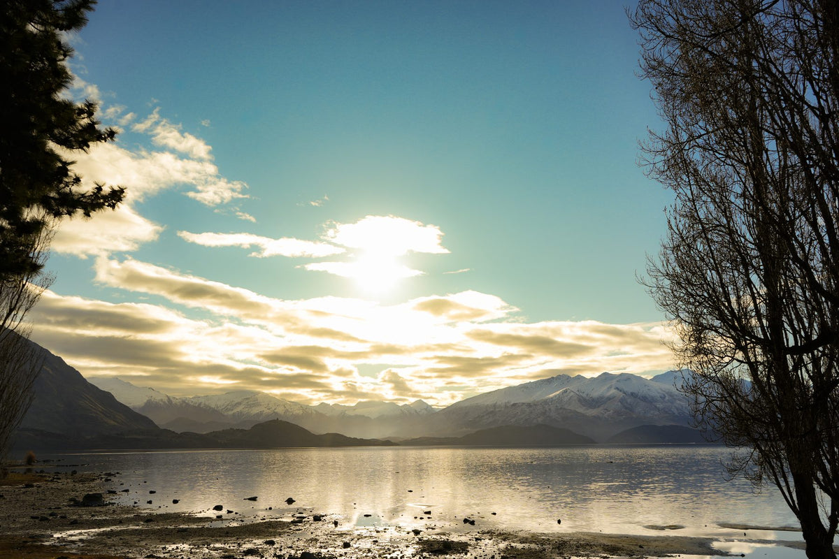 Late afternoon light over a lake and mountains in the Southern Lakes
