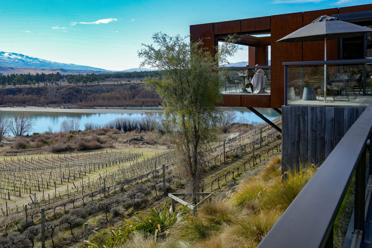 A cantilevered cellar door above a Bannockburn vineyard and the Kawarau River