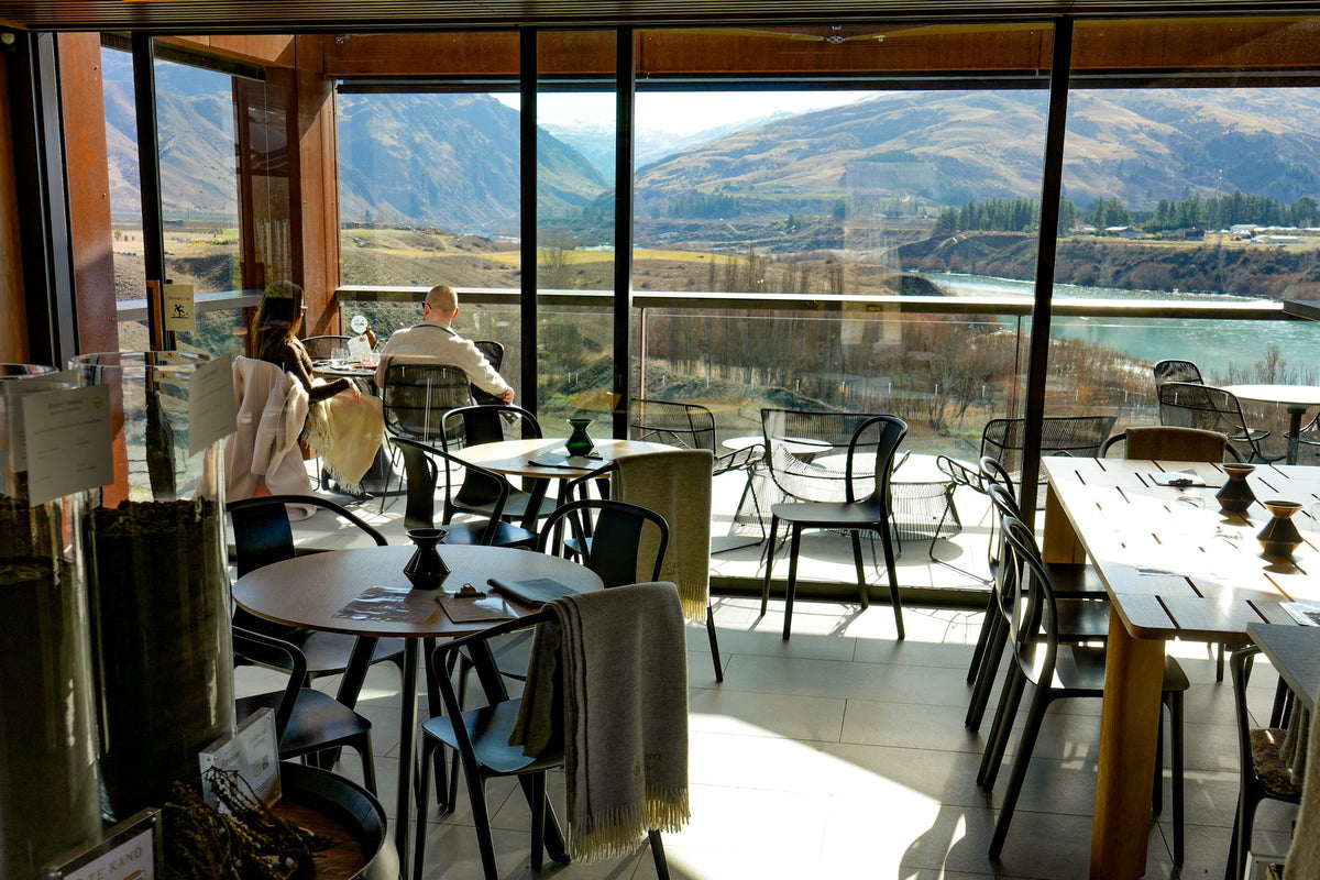 A cellar door dining room looking out over the Cromwell Basin
